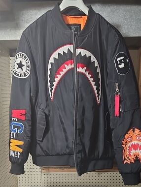 Black Shark-Mouth Patch Bomber Jacket with Multicolor Sleeve Patches Hudson
